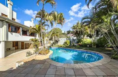 Casa em condomínio fechado com 6 quartos à venda na rua gustavo schmidt, 277, três figueiras, porto alegre, 520 m2 por r$ 2.375.000