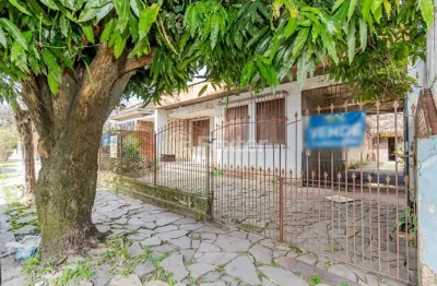 Casa com 3 quartos à venda na rua afonso rodrigues, 149, jardim botânico, porto alegre, 180 m2 por r$ 590.000