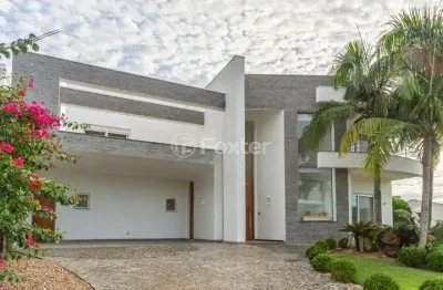 Casa em condomínio fechado com 4 quartos à venda na avenida juca batista, 8000, belém novo, porto alegre, 432 m2 por r$ 2.700.000