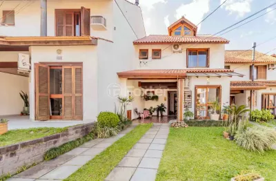 Casa em condomínio fechado com 3 quartos à venda na avenida eduardo prado, 695, cavalhada, porto alegre, 126 m2 por r$ 750.000