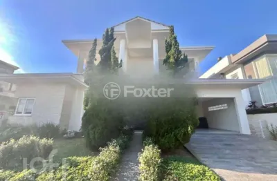 Casa em condomínio fechado com 4 quartos à venda na rodovia doutor antônio luiz moura gonzaga, 3825, rio tavares, florianópolis, 328 m2 por r$ 4.950.000