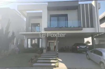 Casa em condomínio fechado com 4 quartos à venda na avenida santos ferreira, 3125, estância velha, canoas, 259 m2 por r$ 2.800.000