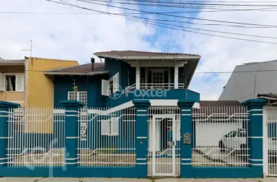 Casa com 4 quartos à venda na rua joão paulo ii, 114, harmonia, canoas, 234 m2 por r$ 1.100.000