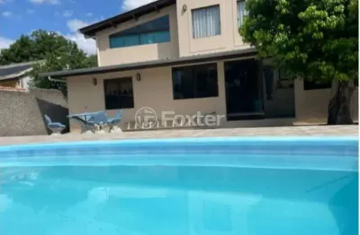 Casa em condomínio fechado com 6 quartos à venda na rua crisantemo, 364, águas claras, viamão, 450 m2 por r$ 800.000
