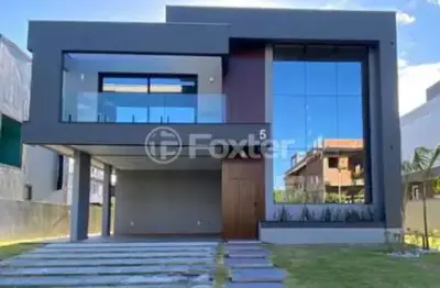 Casa em condomínio fechado com 4 quartos à venda na rodovia aparício ramos cordeiro, 110, campeche, florianópolis, 360 m2 por r$ 4.560.000