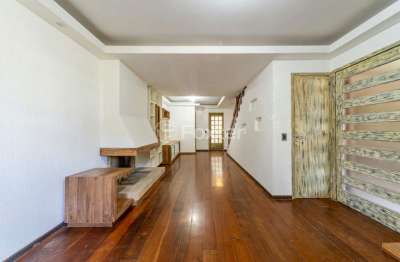 Casa em condomínio fechado com 4 quartos à venda na rua general nestor silva soares, 285, três figueiras, porto alegre, 179 m2 por r$ 1.250.000
