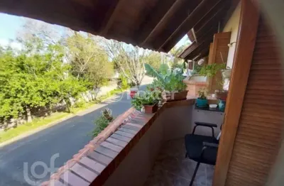 Casa com 3 quartos à venda na Rua dos Guenoas, 671, Guarujá, Porto Alegre, 135 m2 por R$ 549.000