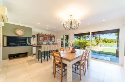 Casa em condomínio fechado com 4 quartos à venda na avenida juca batista, 9000, belém novo, porto alegre, 341 m2 por r$ 2.450.000