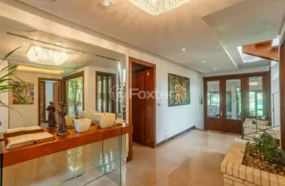 Casa em condomínio fechado com 4 quartos à venda na avenida juca batista, 8000, chapéu do sol, porto alegre, 600 m2 por r$ 4.350.000