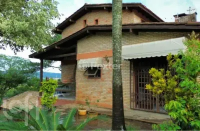 Casa com 4 quartos à venda na rua pedro de oliveira frança, 80, hípica, porto alegre, 470 m2 por r$ 1.100.000