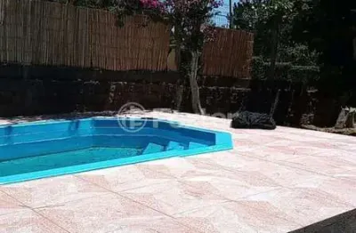 Casa com 4 quartos à venda na rua pedro de oliveira frança, 80, hípica, porto alegre, 470 m2 por r$ 1.100.000