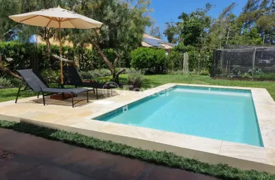 Casa em condomínio fechado com 3 quartos à venda na avenida fernandes bastos, 5386, centro, tramandaí, 180 m2 por r$ 1.580.000