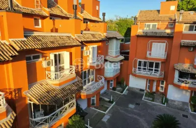 Casa em condomínio fechado com 3 quartos à venda na avenida guaíba, 4400, vila assunção, porto alegre, 252 m2 por r$ 1.590.000