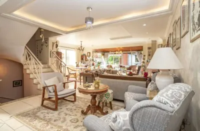 Casa em condomínio fechado com 3 quartos à venda na Avenida Guaíba, 4400, Vila Assunção, Porto Alegre, 252 m2 por R$ 1.800.000