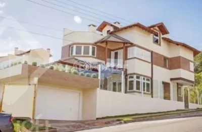 Casa com 3 quartos à venda na rua heitor kramer, 540, guarujá, porto alegre, 290 m2 por r$ 790.000