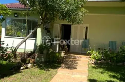Casa em condomínio fechado com 4 quartos à venda na rua da sinceridade, 525, parque eldorado, eldorado do sul, 235 m2 por r$ 900.000
