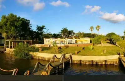 Casa em condomínio fechado com 3 quartos à venda na rua joão inácio da silveira, 785, arquipélago, porto alegre, 180 m2 por r$ 2.527.000