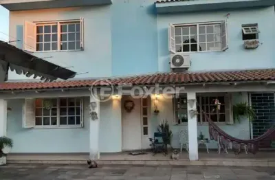 Casa com 4 quartos à venda na avenida josé corrêa da silva, 547, cavalhada, porto alegre, 162 m2 por r$ 570.000