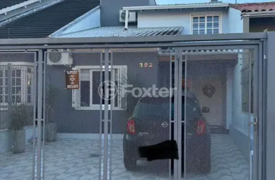 Casa com 2 quartos à venda na rua constantino fernando onorato bottin, 302, hípica, porto alegre, 99 m2 por r$ 650.000