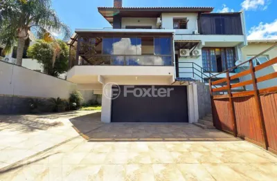 Casa em condomínio fechado com 3 quartos à venda na rua alcebíades antônio dos santos, 356, nonoai, porto alegre, 330 m2 por r$ 1.720.000