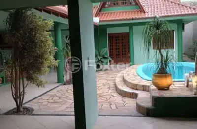 Casa com 3 quartos à venda na rua bagé, 514, niterói, canoas, 224 m2 por r$ 980.000