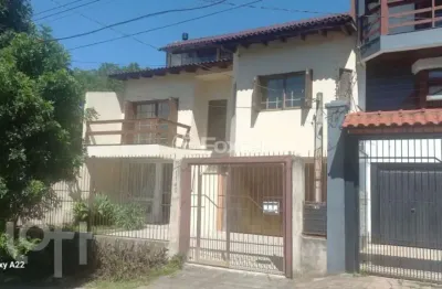 Casa com 3 quartos à venda na avenida doutor petrônio portella, 1140, parque santa fé, porto alegre, 287 m2 por r$ 549.000