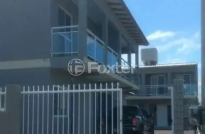 Casa em condomínio fechado com 2 quartos à venda na rua venâncio aires, 205, balneário  atlântico, arroio do sal, 55 m2 por r$ 237.500