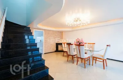 Casa com 3 quartos à venda na rua santo expedito, 63, parque santa fé, porto alegre, 260 m2 por r$ 852.000