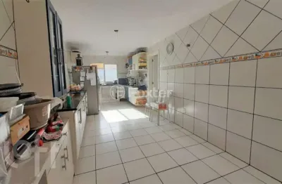 Casa com 4 quartos à venda na avenida joracy camargo, 74, santa tereza, porto alegre, 229 m2 por r$ 450.000