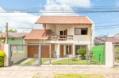 Casa com 3 quartos à venda na rua waldomiro schapke, 281, partenon, porto alegre, 268 m2 por r$ 1.090.000