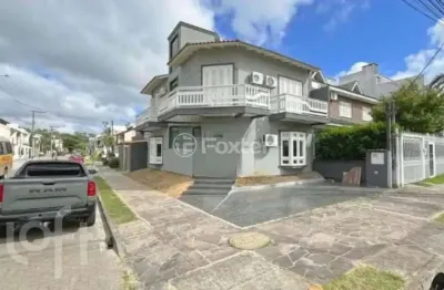 Casa em condomínio fechado com 3 quartos à venda na rua ivo walter kern, 300, hípica, porto alegre, 135 m2 por r$ 895.000