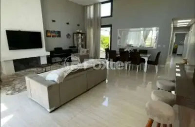 Casa com 4 quartos à venda na rua andira, 2009, arco íris, capão da canoa, 201 m2 por r$ 2.150.000