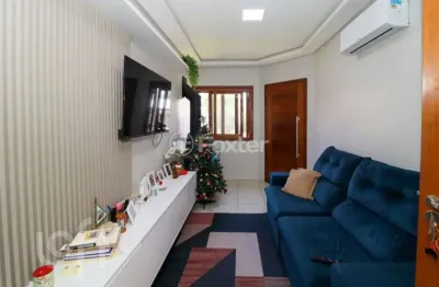 Casa com 3 quartos à venda na rua hélio fraga de moraes sarmento, 75, são josé, canoas, 108 m2 por r$ 550.000