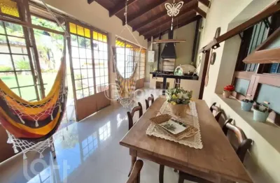 Casa com 3 quartos à venda na avenida fábio araújo santos, 242, nonoai, porto alegre, 238 m2 por r$ 867.000