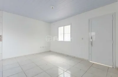 Casa em condomínio fechado com 2 quartos à venda na Rua Nicolau Hees, 192, Santa Fé, Gravataí, 42 m2 por R$ 240.000