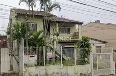 Casa com 4 quartos à venda na rua batista xavier, 423, partenon, porto alegre, 200 m2 por r$ 430.000