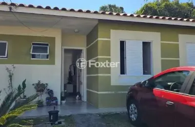 Casa em condomínio fechado com 2 quartos à venda na Rua Trinta e Três, 300, Jardim Algarve, Alvorada, 53 m2 por R$ 245.300