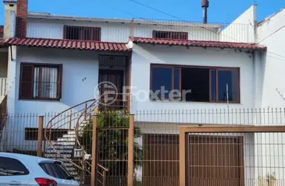 Casa com 4 quartos à venda na Rua General Sady Cahen Fischer, 55, Parque Santa Fé, Porto Alegre, 390 m2 por R$ 1.300.000