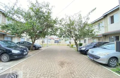 Casa em condomínio fechado com 3 quartos à venda na Rua dos Guaramirins, 303, Igara, Canoas, 107 m2 por R$ 465.000