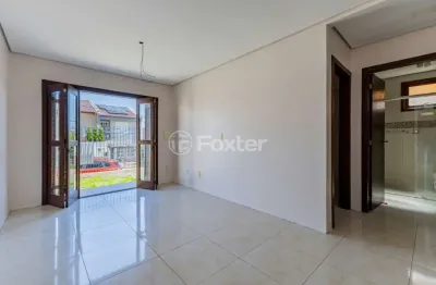 Casa com 4 quartos à venda na Rua Getúlio Celso Nunes, 86, Loteamento Jardim Timbaúva, Gravataí, 126 m2 por R$ 640.000
