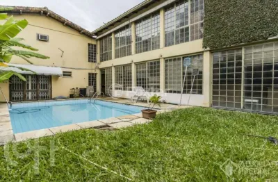 Casa com 5 quartos à venda na Rua Eudoro Berlink, 1073, Auxiliadora, Porto Alegre, 340 m2 por R$ 3.200.000