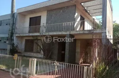 Casa com 3 quartos à venda na Rua Ângelo Dourado, 334, Anchieta, Porto Alegre, 300 m2 por R$ 490.000