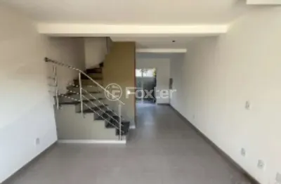 Casa em condomínio fechado com 2 quartos à venda na Rua Miguel Ascoleze, 125, Vila Nova, Porto Alegre, 59 m2 por R$ 299.000