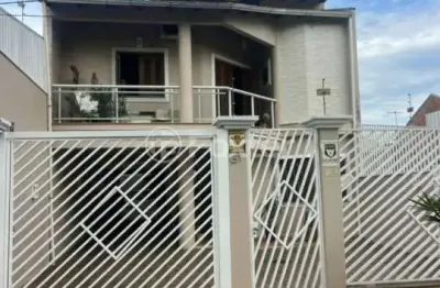 Casa com 3 quartos à venda na Rua Derly da Costa Leite, 61, Harmonia, Canoas, 260 m2 por R$ 1.290.000