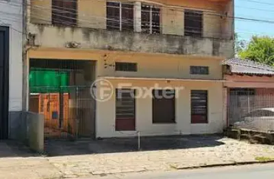 Casa comercial com 1 sala à venda na Avenida General Emílio Lúcio Esteves, 394, Santa Maria Goretti, Porto Alegre, 220 m2 por R$ 680.000