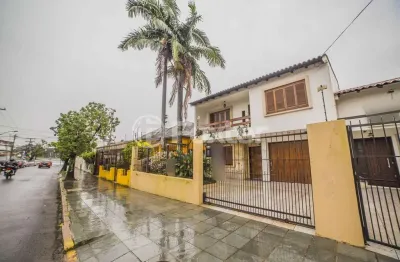 Casa comercial com 3 salas à venda na rua otávio dutra, 76, santa tereza, porto alegre, 238 m2 por r$ 1.172.000