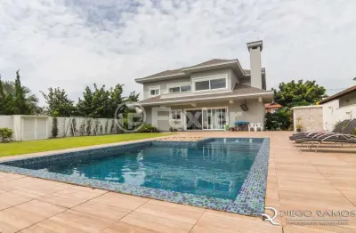 Casa em condomínio fechado com 5 quartos à venda na avenida juca batista, 8000, belém novo, porto alegre, 413 m2 por r$ 3.600.000