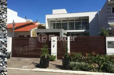Casa em condomínio fechado com 3 quartos à venda na rua fernando jorge schneider, 705, hípica, porto alegre, 258 m2 por r$ 1.390.000