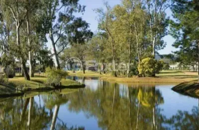 Terreno em condomínio fechado à venda na avenida juca batista, 8000, belém novo, porto alegre, 1000 m2 por r$ 650.000