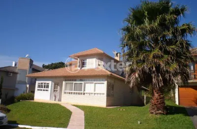 Casa em condomínio fechado com 3 quartos à venda na estrada capitão gentil machado de godoy, 4500, vila elsa, viamão, 240 m2 por r$ 700.000